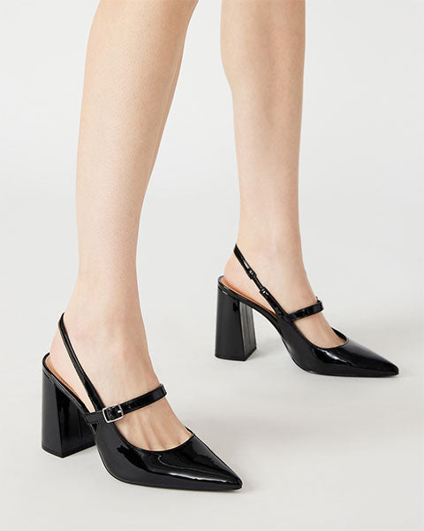 MAEGAN Black Patent Heels by Steve Madden - model view